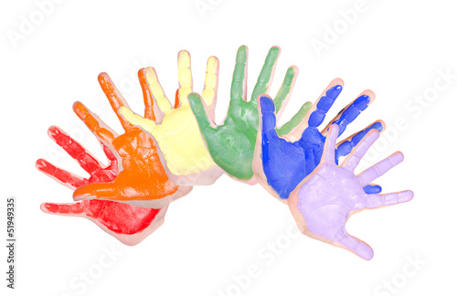 painted hands in rainbow colors