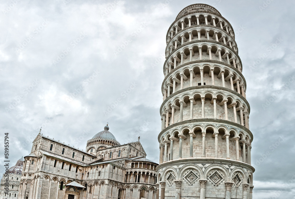 Pisa - Italy: Baptistery and Leaning Tower in a cloudy day