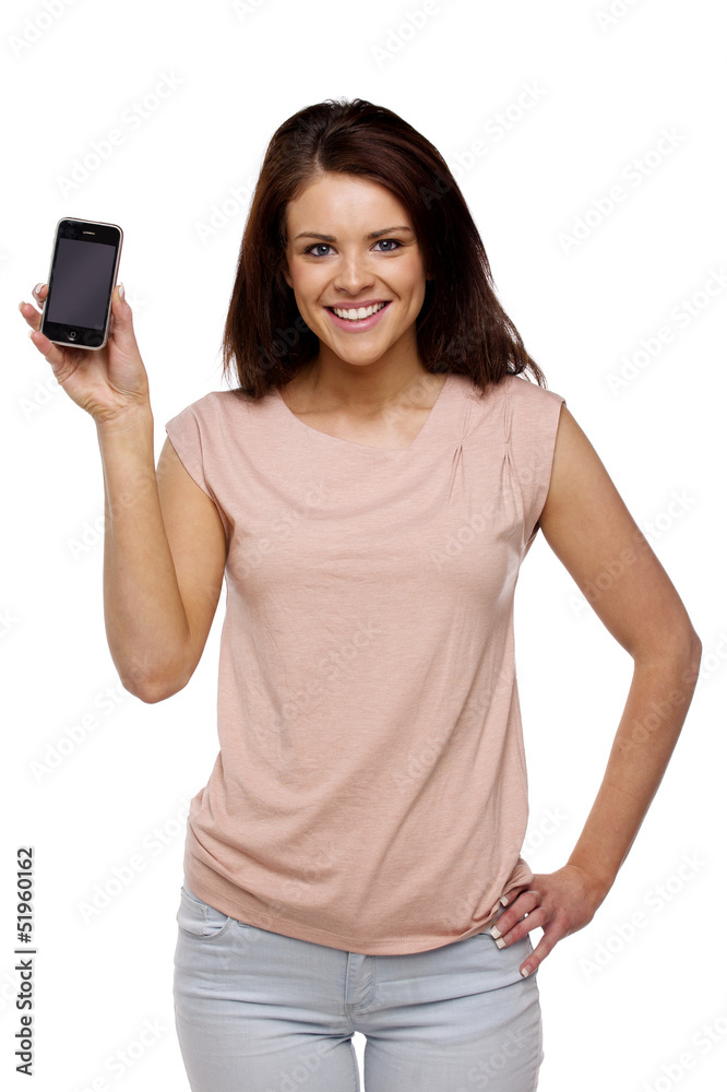 Brunette woman showing the screen of a mobile phone