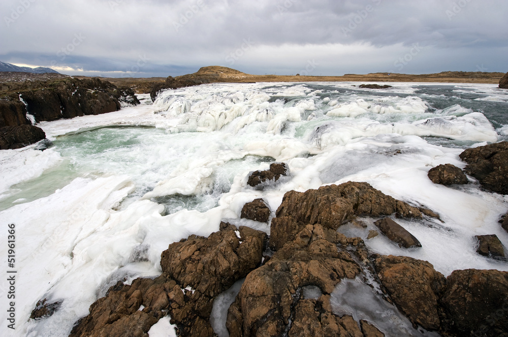 Obraz premium Frozen waterfall in Iceland