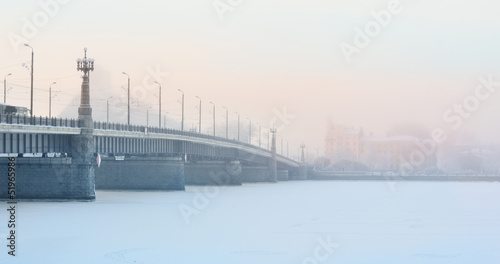 Riga cituscape with stone bridge in fog