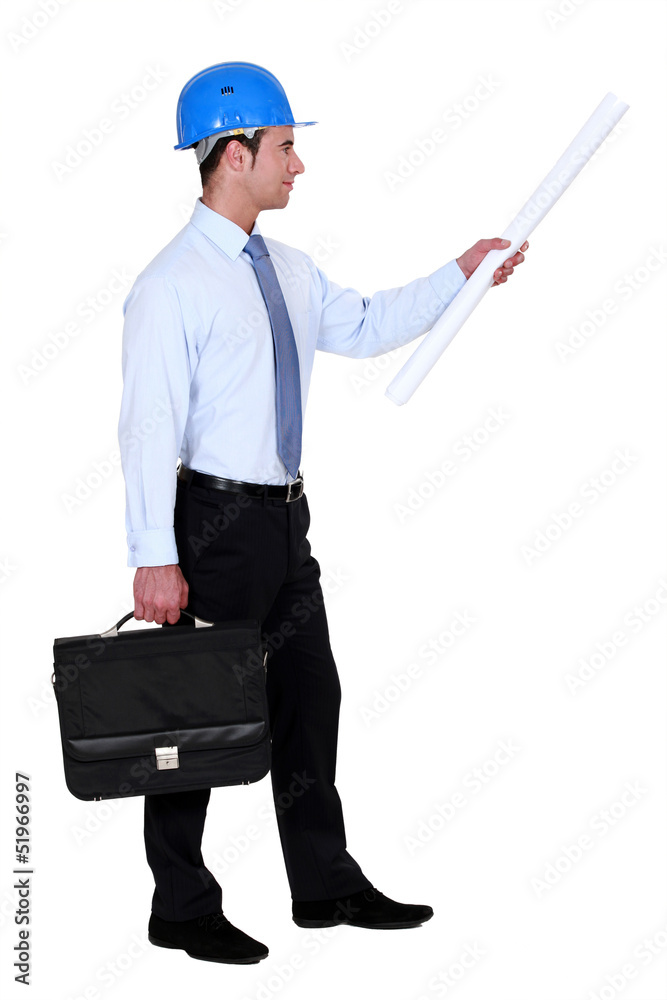 Architect with briefcase and plans Architect with briefcase and plans