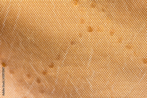 Background of golden fabric. texture