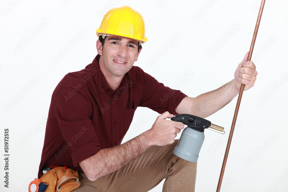 craftsman holding a welding torch craftsman holding a welding torch