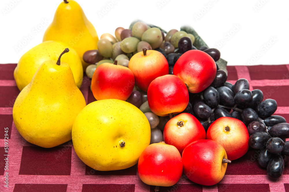 fruit on a red tablecloth fruit on a red tablecloth