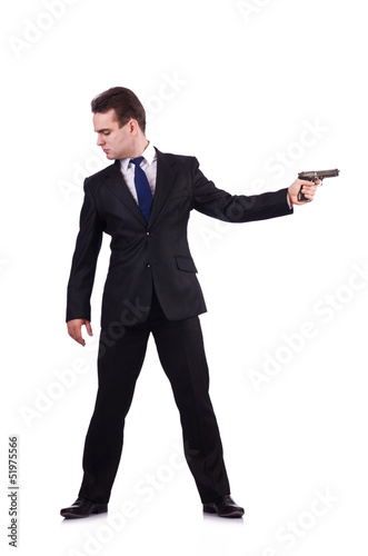 Businessman with gun isolated on white