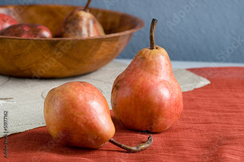 two red pears on textile serviette