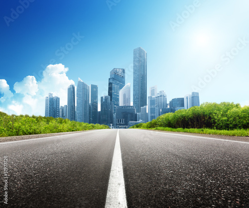 Fototapeta Naklejka Na Ścianę i Meble -  Asphalt road and modern city