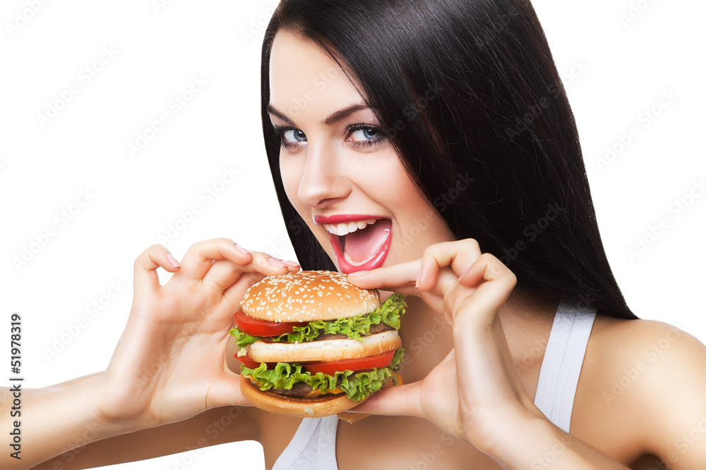 beautiful brunette woman biting hamburger beautiful brunette woman biting hamburger