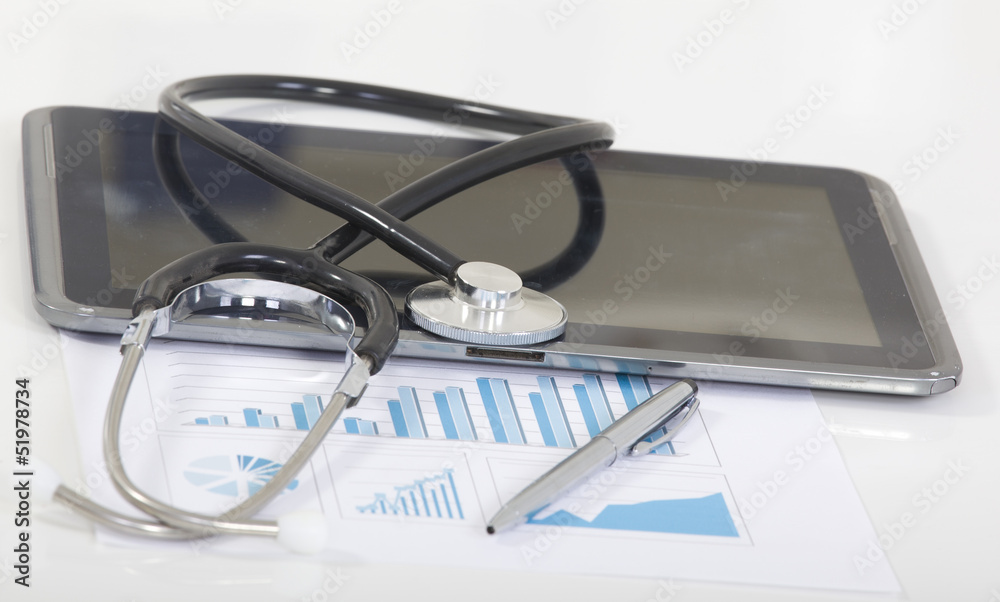 Digital tablet with stethoscope and paperwork Digital tablet with stethoscope and paperwork