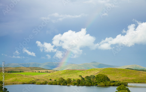 rainbow over lake