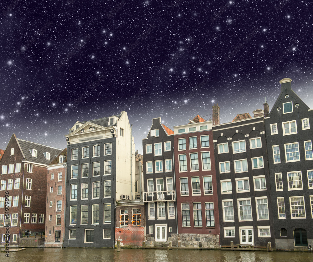 Amsterdam. Beautiful view of classic buildings with night sky