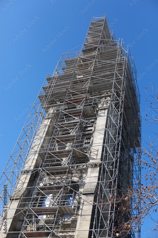 Scaffolding surrounding tower