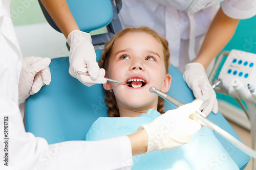 Little girl visiting dentist