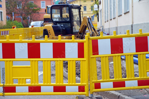 Construction site with excavator photo