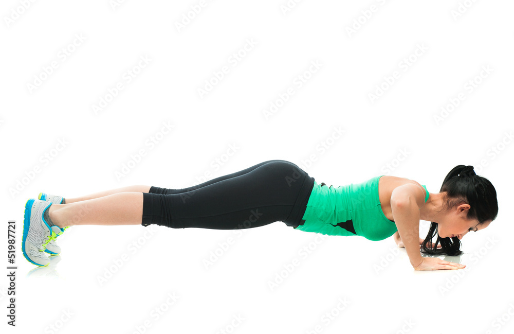 Beautiful sporty woman doing exercise on the floor Beautiful sporty woman doing exercise on the floor