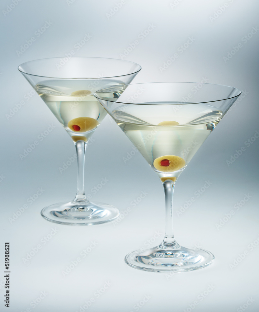 two glasses martini with olive. cocktail isolated
