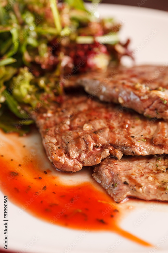 steak with salad