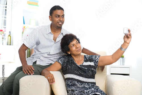 Photography indian family lifestyle photo , son and mother taking self photo