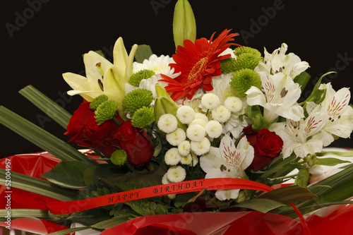 Floral composition with the inscription 