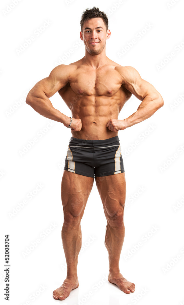 Bodybuilder posing over white background