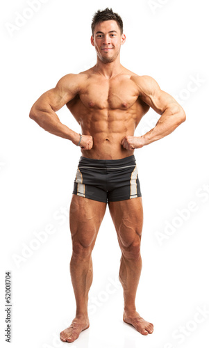 Bodybuilder posing over white background