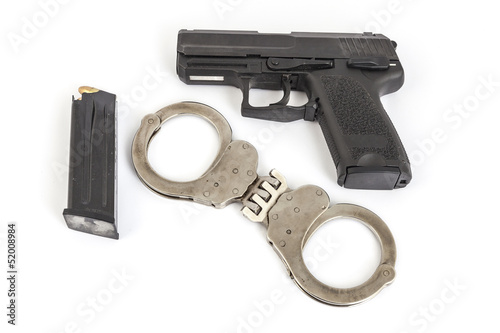 gun and handcuffs