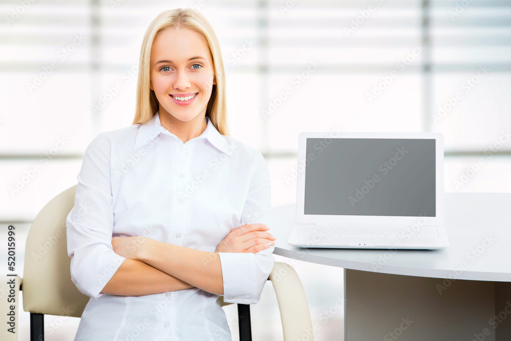 Young business woman using laptop Young business woman using laptop