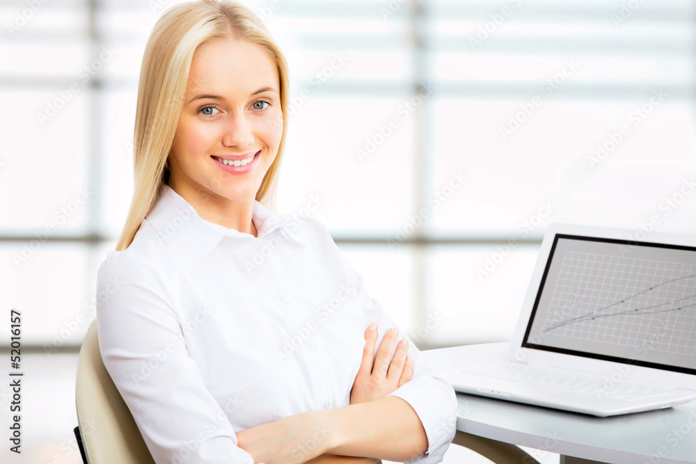 Young business woman using laptop Young business woman using laptop