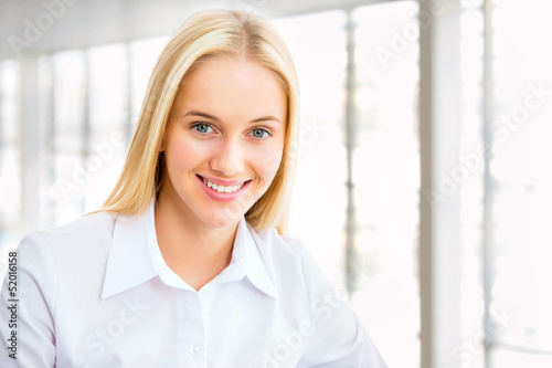 Young business woman using laptop