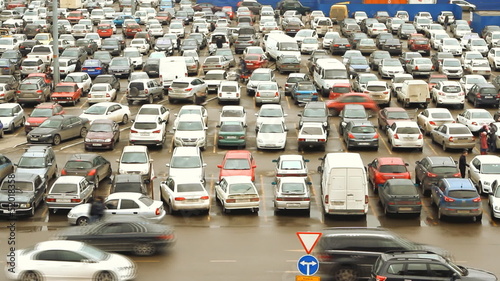 Lots of cars parking in the city