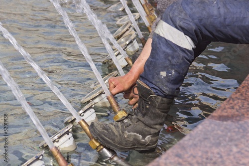 repair and adjustment of the fountain