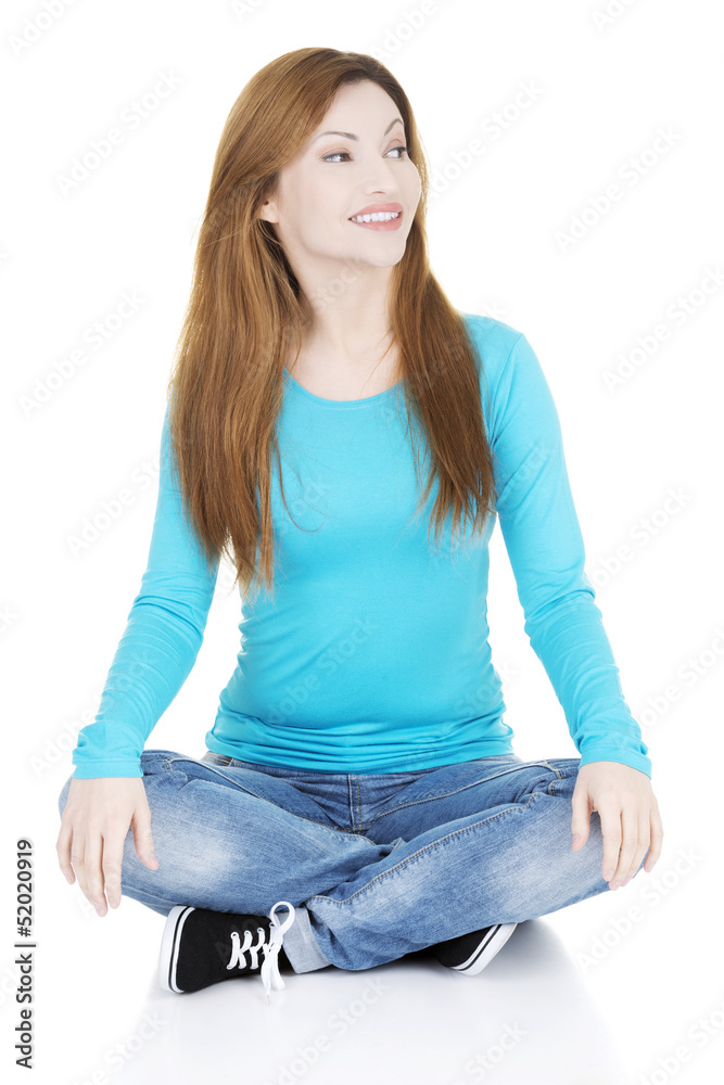 Happy attractive woman sitting