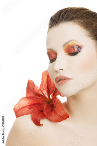Fototapeta Naklejka Na Ścianę i Meble -  Beautiful woman with a red lily