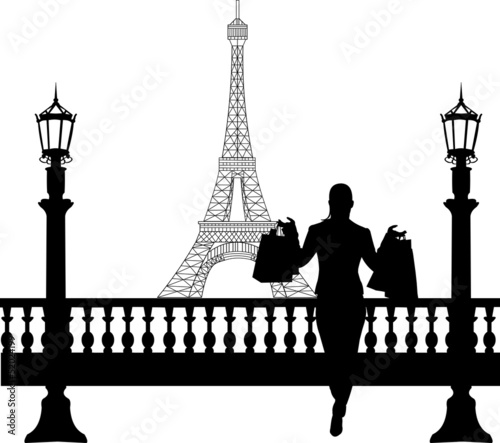 Woman in shopping in Paris in front of Eiffel tower silhouette