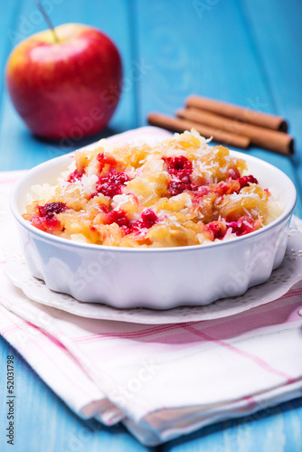 Rice pudding with applem raspberry and cinnamon