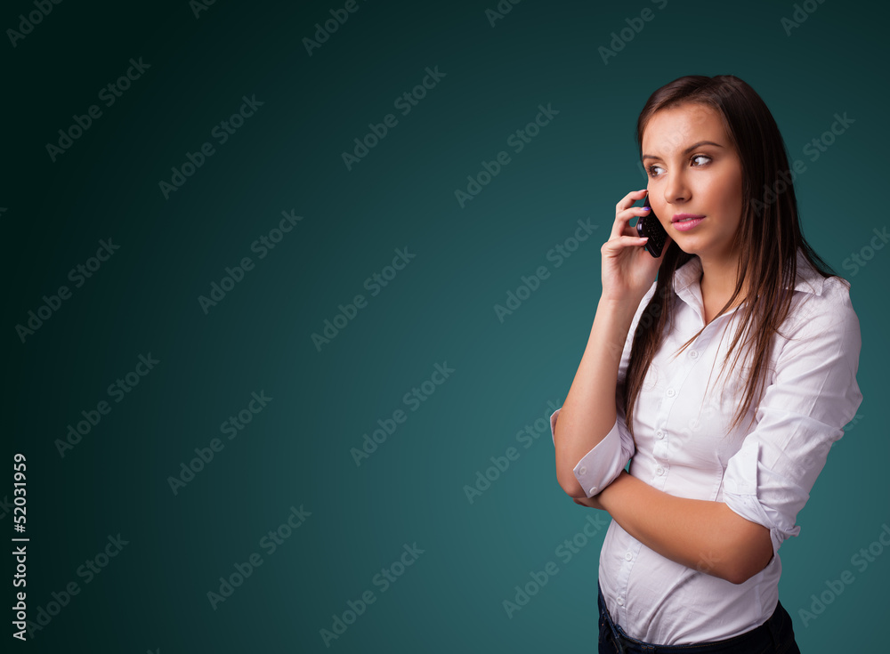 Young woman making phone call with copy space Young woman making phone call with copy space