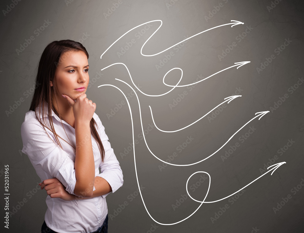 Attractive teenager looking at multiple curly arrows