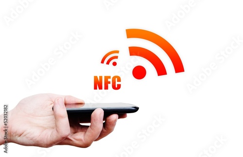 Hand holding smartphone with NFC technology - near field communi