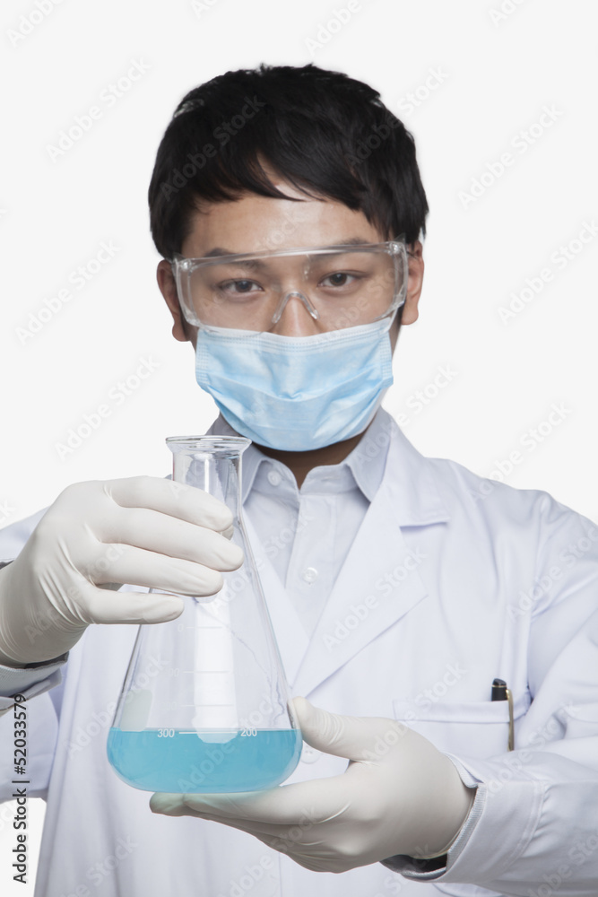 Fototapeta premium Scientist Holding Beaker
