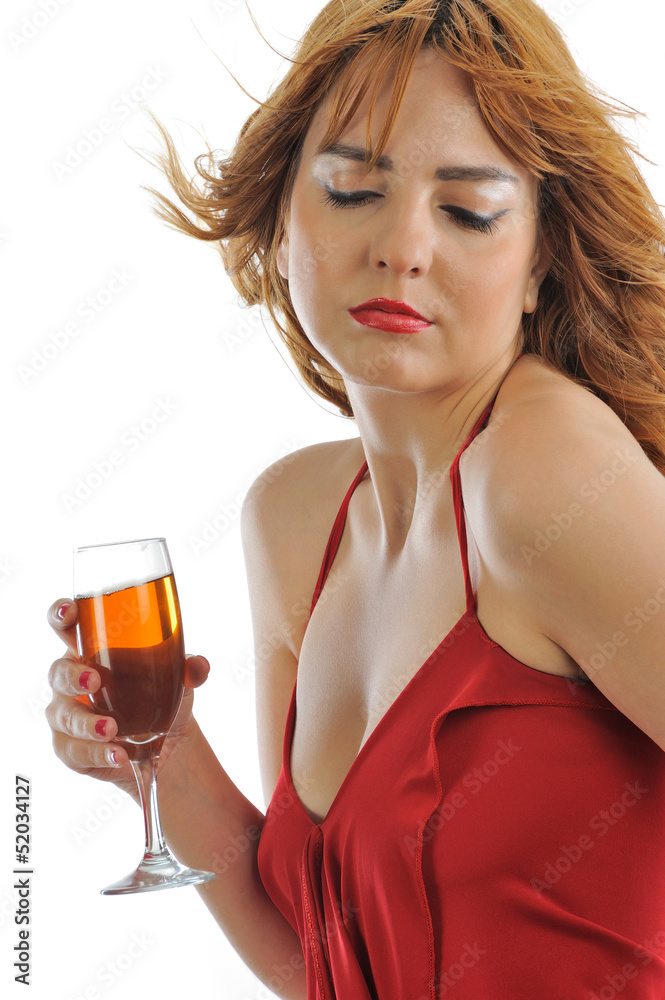 Beautiful blonde girl with red dress enjoying wine Beautiful blonde girl with red dress enjoying wine