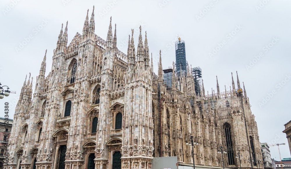 Milan gothic cathedral at the piazza del duomo