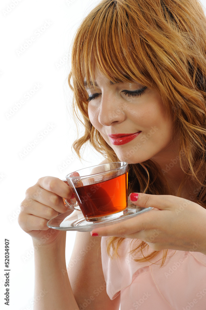 Beautiful blonde woman with glass cup of turkish tea Beautiful blonde woman with glass cup of turkish tea