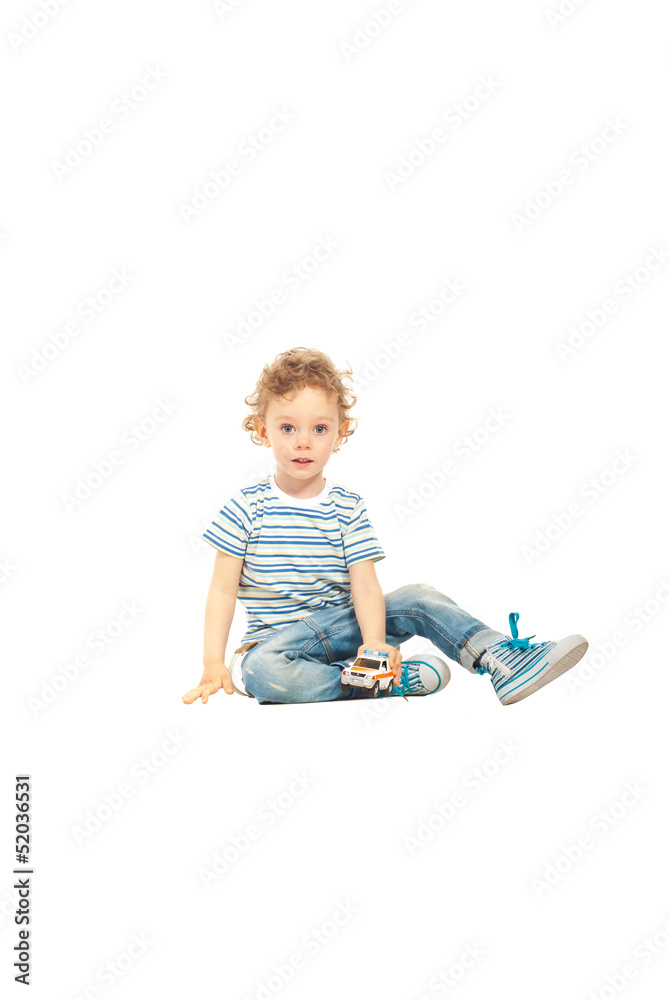 Beauty boy playing with a car Beauty boy playing with a car