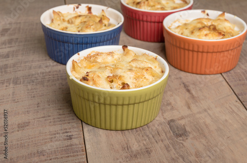 Bright bowls of baked macaroni and cheese