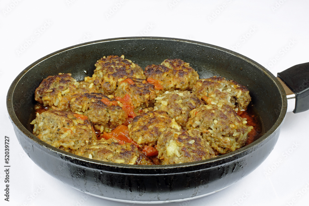 fresh meatballs brger on the frying pan