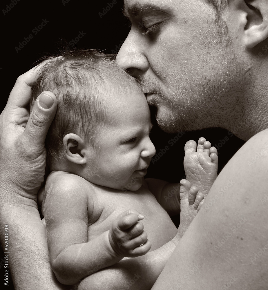 Father and his newborn baby.