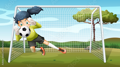 A sporty young girl playing football