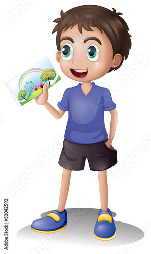 A young man holding a picture