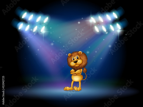 A lion standing at the stage with spotlights